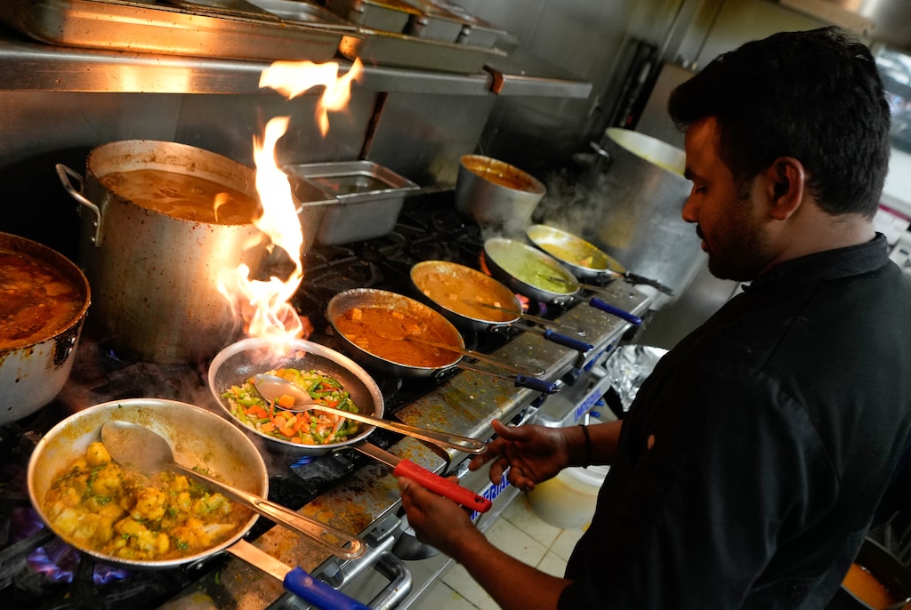 (Francisco Kjolseth | The Salt Lake Tribune) Chef Kumar Kannan prepares multiple Indian dishes at Saffron Valley in Sugarhouse on Thursday, March 2, 2023. 