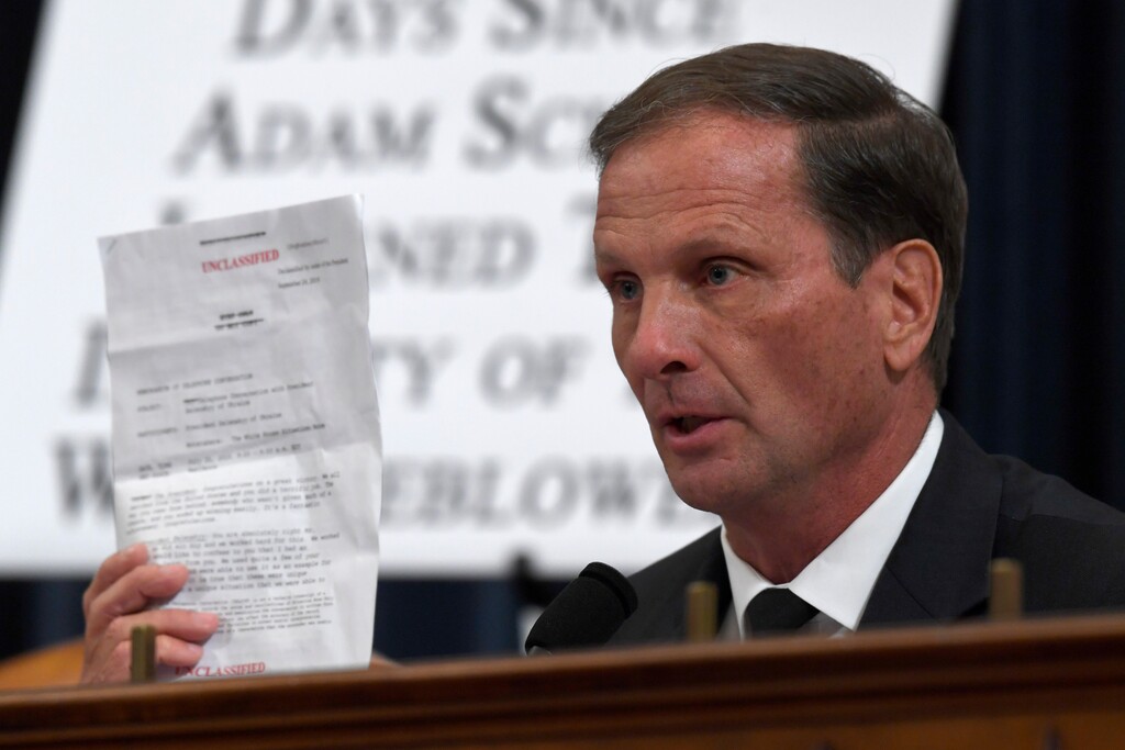 (Susan Walsh  |  AP photo) Rep. Chris Stewart, R-Utah, holds up the transcript summary of the call between President Donald Trump and Ukraine President Volodymyr Zelenskiy as he questions top U.S. diplomat in Ukraine William Taylor, and career Foreign Service officer George Kent, at the House Intelligence Committee hearing on Capitol Hill in Washington, Wednesday, Nov. 13, 2019. 