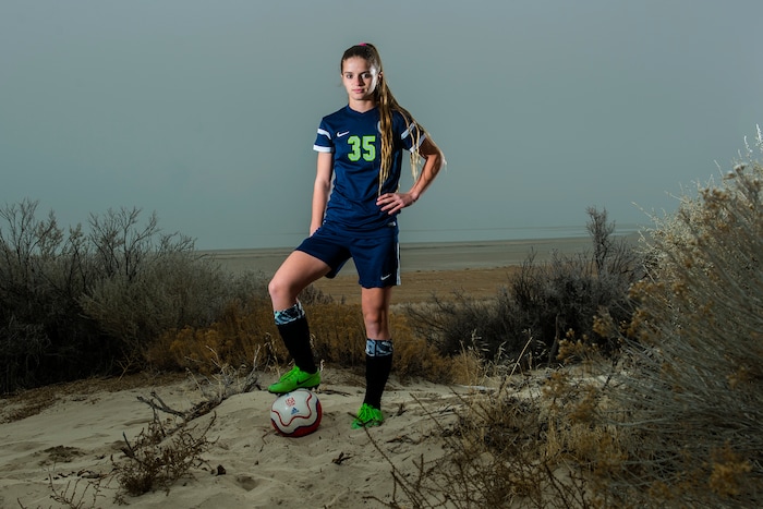 (Chris Detrick | The Salt Lake Tribune) Syracuse's Caroline Stringfellow poses for a portrait near Bridger Bay on Antelope Island State Park Tuesday, December 12, 2017.