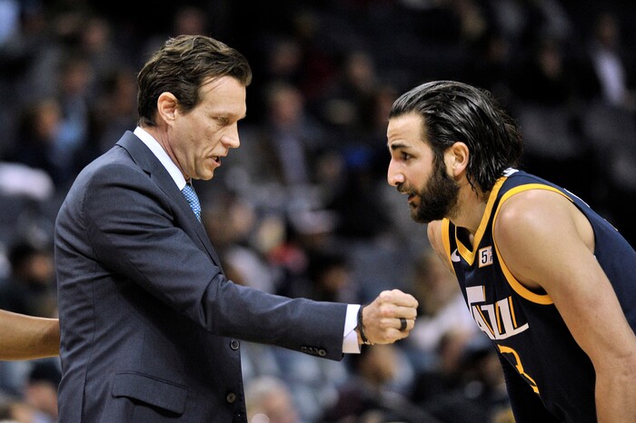 Utah Jazz coach Quin Snyder, left, talks with guard Ricky Rubio during the first half of the team's NBA basketball game against the Memphis Grizzlies on Wednesday, Feb. 7, 2018, in Memphis, Tenn. (AP Photo/Brandon Dill)