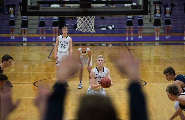 Scott Sommerdorf | The Salt Lake TribuneCopper Hills fans try to distract Riverton's Ben Neilson during this first half foul shot. Copper Hills defeated Riverton 54-50, Friday, February, 2, 2018. 