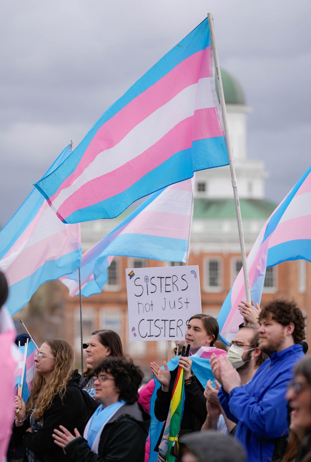 (Francisco Kjolseth  | The Salt Lake Tribune) Hundreds of people show up at the Utah State Capitol on Mar. 29, 2025 to fly the largest transgender pride flag in Utah. The unveiling of the flag is part of celebrations for Transgender Day of Visibility, hosted by local nonprofits Utah Pride Center and The Glitter Foundation.