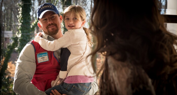 (Claudette Barius  |  Fingerprint Releasing/Bleecker Street) Jimmy Logan (Channing Tatum) delivers his daughter Sadie (Farrah Mackenzie) to his ex-wife, Bobbie Jo (Katie Holmes), in Steven Soderbergh's caper comedy "Logan Lucky."