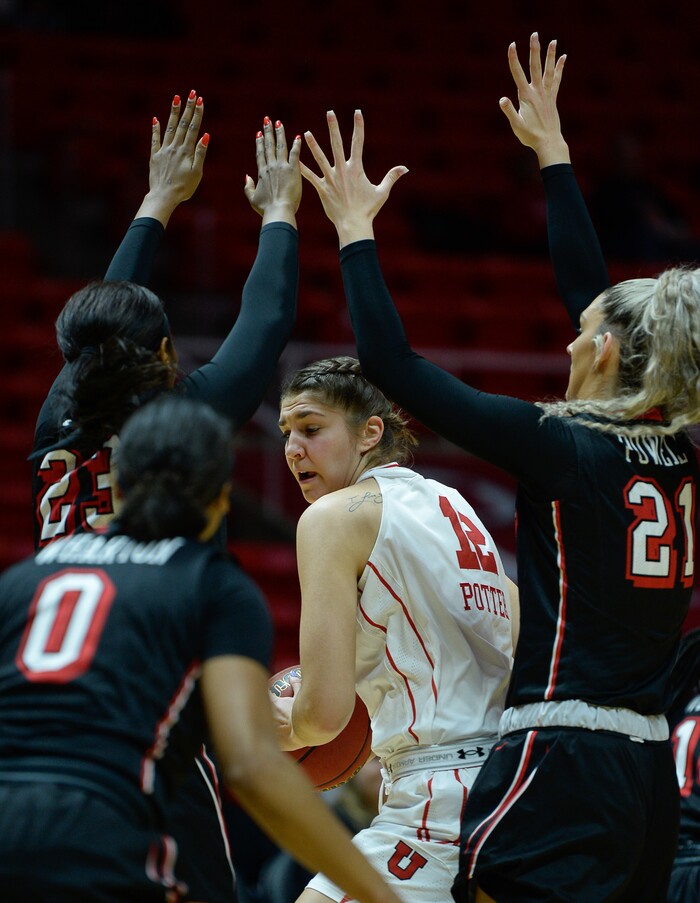 (Francisco Kjolseth  |  The Salt Lake Tribune)  Utah Utes forward Emily Potter (12) runs in to a UNLV wall as Utah hosts UNLV in women's NCAA basketball at the Huntsman Center, Thursday, March 15, 2018.