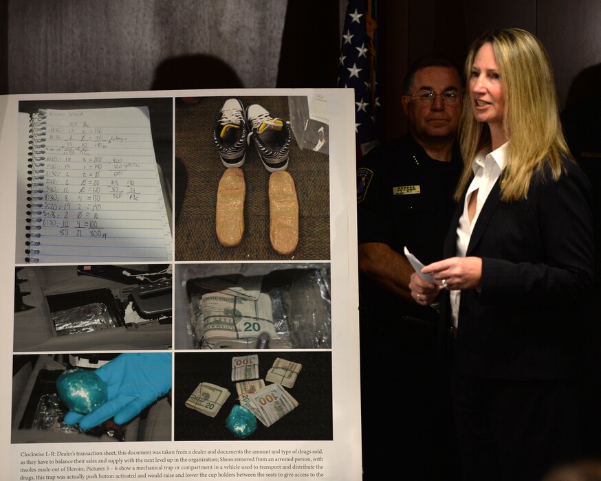 Steve Griffin | The Salt Lake Tribune
Nicki Hollmann, DEA Assistant Special Agent in Charge stands with leaders of The Metro Narcotics Task Force and its partners as they announce the seizure of 31 pounds of heroin during a press conference at the U.S. Drug Enforcement AdministrationÕs Salt Lake City District Office in Salt Lake City, Thursday, August 21, 2014.