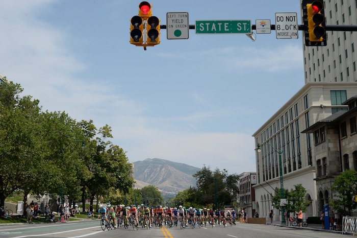 (Scott Sommerdorf   |  The Salt Lake Tribune)   Riders on South Temple head toward the turn onto State Street during the 8th lap of the Tour of Utah. Robert Britton is the winner of the 2017 Tour of Utah, Sunday, August 6, 2017.