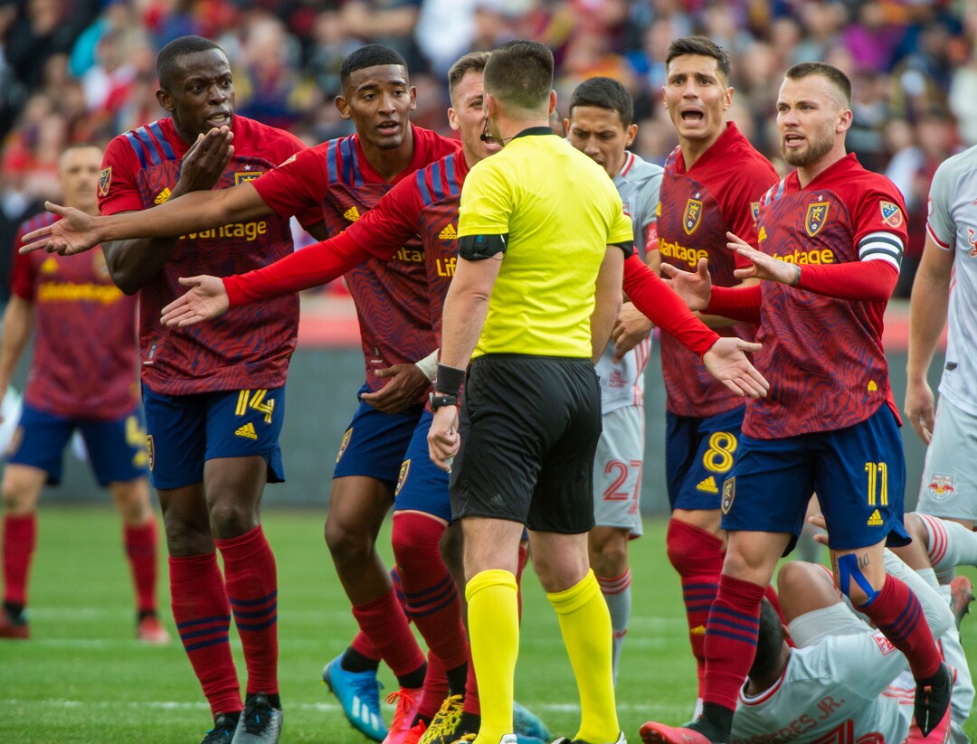 (Rick Egan  |  The Salt Lake Tribune)   Real Salt Lake plead with the official, as New York Red Bulls midfielder Cristian Casseres Jr (23) takes his time getting up, in MLS acton between Real Salt Lake and the New York Red Bulls at Rio Tinto Stadium, Saturday, March 7, 2020.