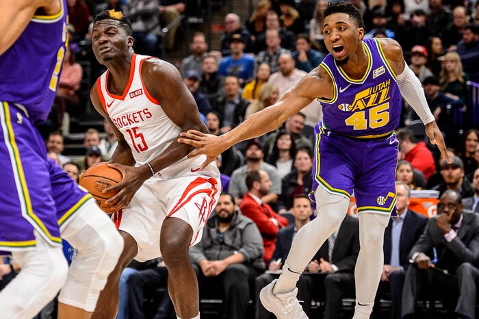 (Trent Nelson | The Salt Lake Tribune)  
Houston Rockets center Clint Capela (15) and Utah Jazz guard Donovan Mitchell (45). The Utah Jazz host the Houston Rockets, NBA basketball in Salt Lake City on Thursday Dec. 6, 2018.