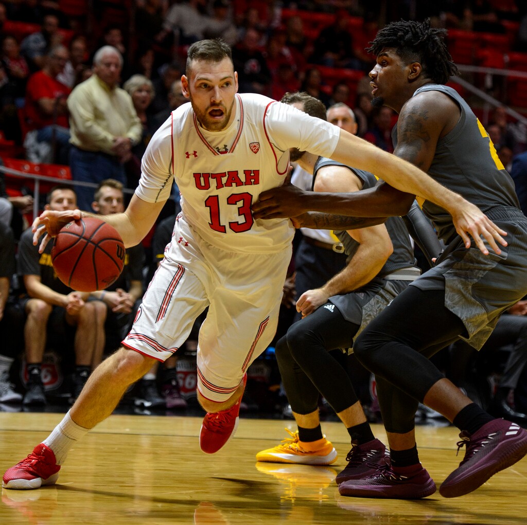 (Steve Griffin  |  The Salt Lake Tribune) Utah Utes forward David Collette (13) drives the lane during the Utah Utes versus Arizona State Sound Devils at the Huntsman Center on the University of Utah campus in Salt Lake City Sunday January 7, 2018.
