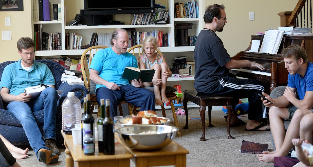 (Al Hartmann  |  The Salt Lake Tribune)
Believers in Denver Snuffer's Remnant movement gather in a Sandy home for a fellowship meeting Sunday, Aug. 13, to sing songs and partake of the sacrament.