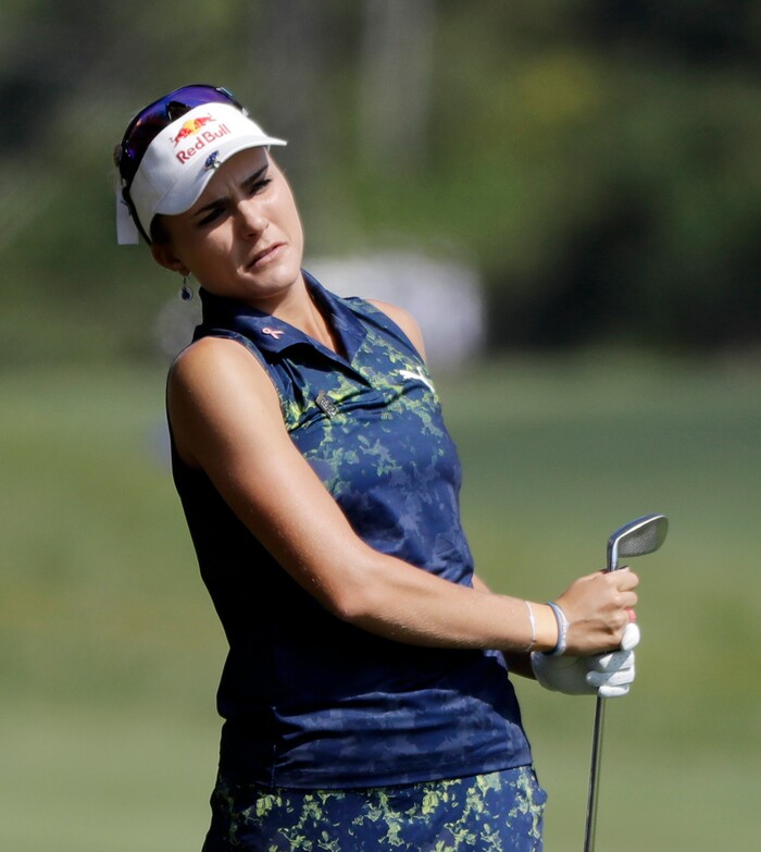 Lexi Thompson watches her shot into the sixth green during the final round of the Indy Women in Tech Championship golf tournament, Saturday, Sept. 9, 2017, in Indianapolis. (AP Photo/Darron Cummings)