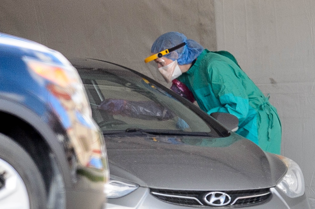 (Trent Nelson  |  The Salt Lake Tribune) COVID-19 testing at Timpanogos Regional Hospital in Orem on Tuesday, April 14, 2020.