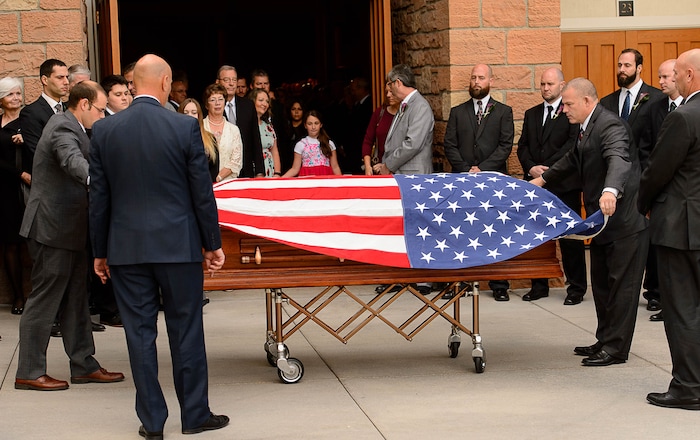(Trent Nelson | The Salt Lake Tribune)  A flag is draped over the casket at funeral services for Elder Robert D. Hales at the Salt Lake Tabernacle in Salt Lake City Friday October 6, 2017.