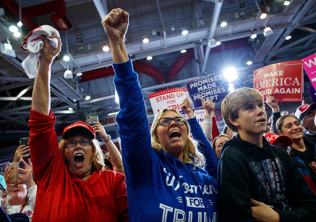 (Carolyn Kaster | The Associated Press) Supporters of President Donald Trump cheer as the president arrives to speak during a rally at Show Me Center, Monday, Nov. 5, 2018, in Cape Girardeau, Mo.