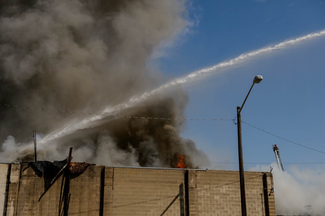 (Trent Nelson  |  The Salt Lake Tribune) Crews work to extinguish a fire at 800 South 200 West in Salt Lake City on Wednesday, Sept. 9, 2020.