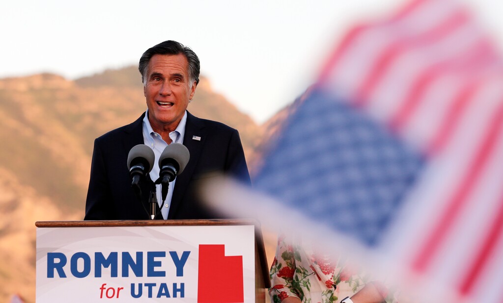 In this Tuesday, June 26, 2018 photo, Mitt Romney, former GOP presidential nominee, addresses supporters at during an election night party in Orem, Utah. Romney looks like a shoo-in for a Senate seat from Utah after winning a landslide primary victory and toning down his criticism of Donald Trump, but first he'll face a Democratic opponent with a distinctly different political outlook. (AP Photo/Rick Bowmer)
