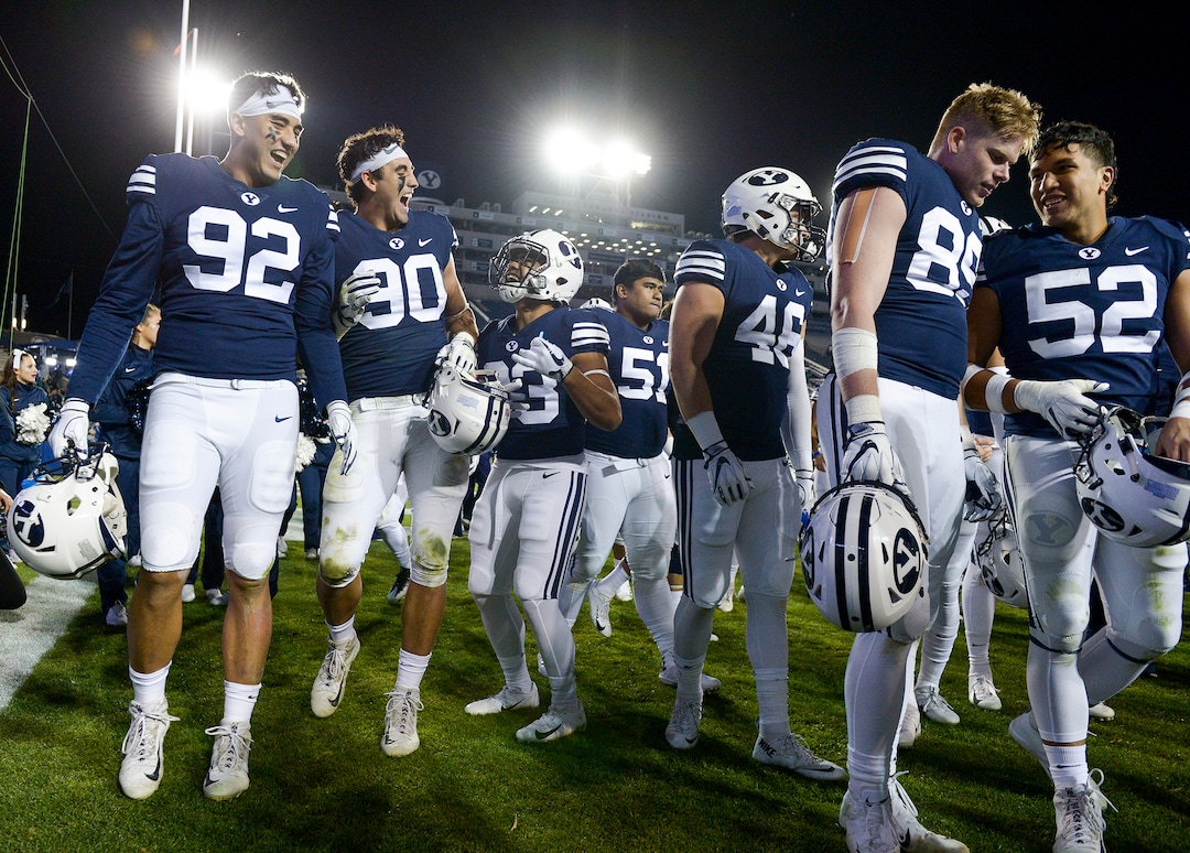 Leah Hogsten  |  The Salt Lake Tribune  The Cougars celebrate the win over Hawaii at Lavell Edwards Stadium in Provo, Saturday Oct. 13, 2018. BYU defeated Hawaii 49-23.