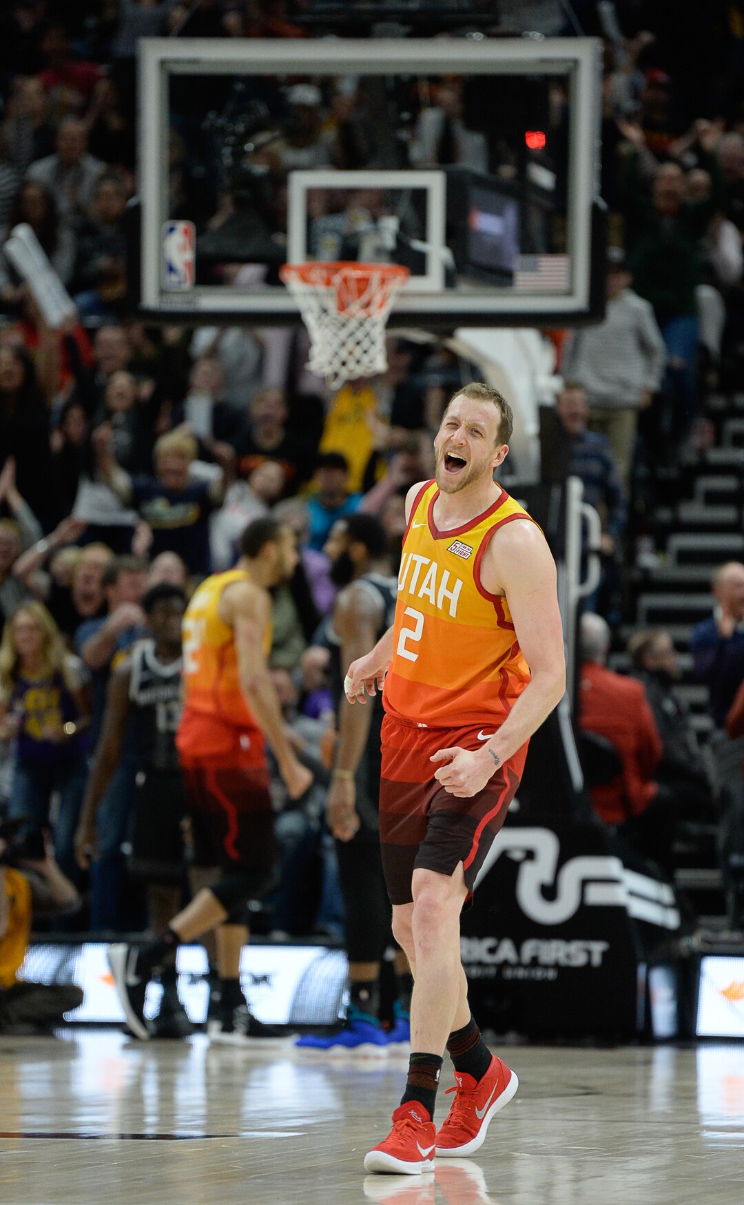 (Francisco Kjolseth  |  The Salt Lake Tribune)  Utah Jazz forward Joe Ingles (2) celebrates a critical point by teammate Utah Jazz guard Donovan Mitchell (45) agains the Pistons in the second half of their NBA game at Vivint Smart Home Arena Monday, Jan. 14, 2019, in Salt Lake City.