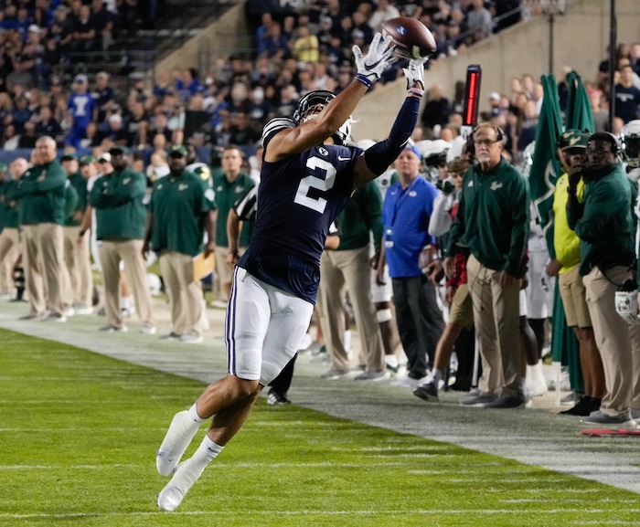 (Francisco Kjolseth | The Salt Lake Tribune) Brigham Young Cougars wide receiver Neil Pau'u (2) tries to pull in a pass in game action between the Brigham Young Cougars and the South Florida Bulls at LaVell Edwards Stadium in Provo, Saturday, Sept. 25, 2021.