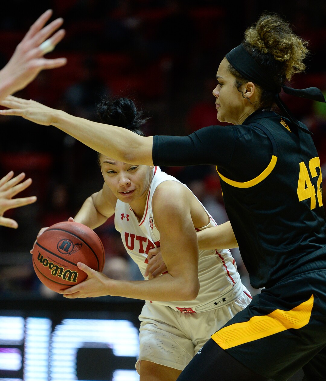 (Francisco Kjolseth  |  The Salt Lake Tribune)  Utah Utes guard Kiana Moore (0) tries to push past Arizona State Sun Devils forward Kianna Ibis (42) in Utes' Pac-12 home opener at the Jon M Huntsman Center on Friday, Jan. 4, 2019. Off to one of their best starts in team history, their twelve in a row winning streak came to an end losing to the Sun Devils 63-65.