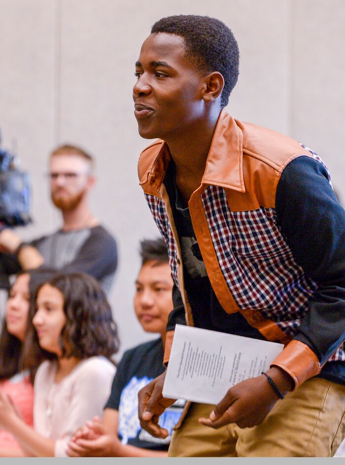 Leah Hogsten | The Salt Lake Tribune With hands on their heart 21 participants, ages 5 to 22, representing 8 countries, spoke the oath of citizenship as America's newest citizens during a youth naturalization ceremony at the Viridian Event Center in West Jordan, Monday, August 6, 2018.