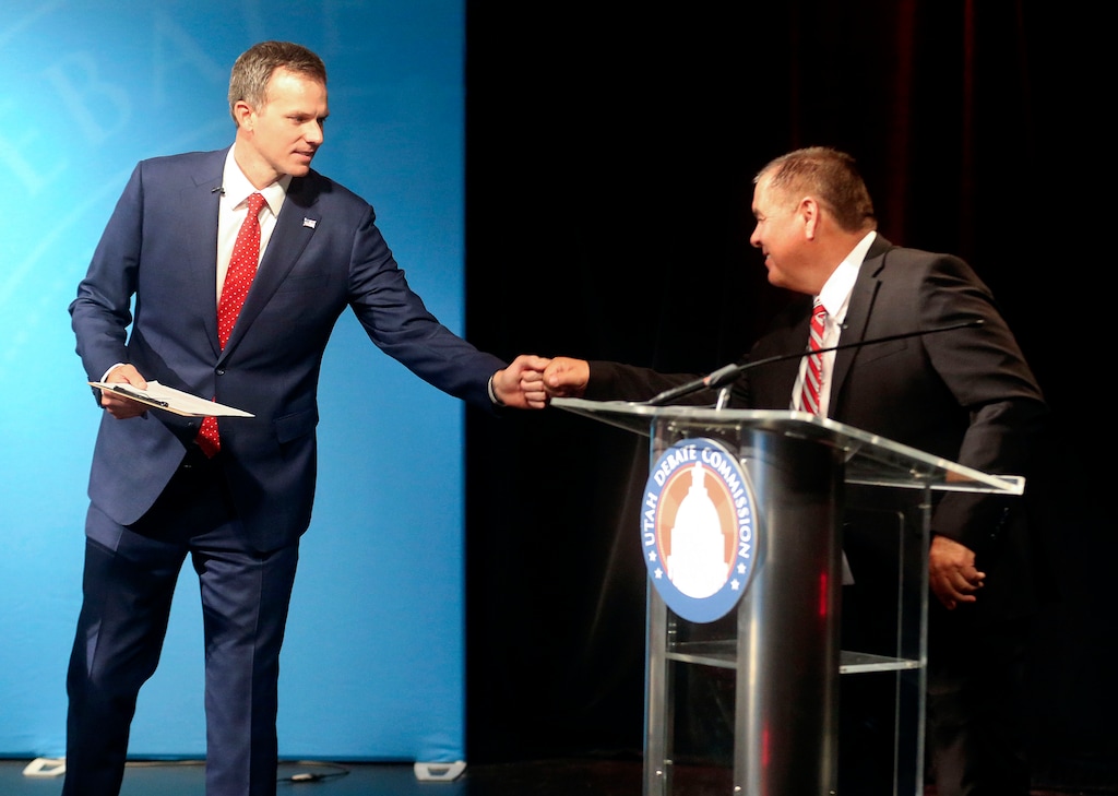 (Kristin Murphy  |  Deseret News/Pool) Republican Blake Moore fist bumps Democrat Darren Perry, candidates in the 1st Congressional District, after participating in a debate at the Triad Center in Thursday, Sept. 24, 2020.