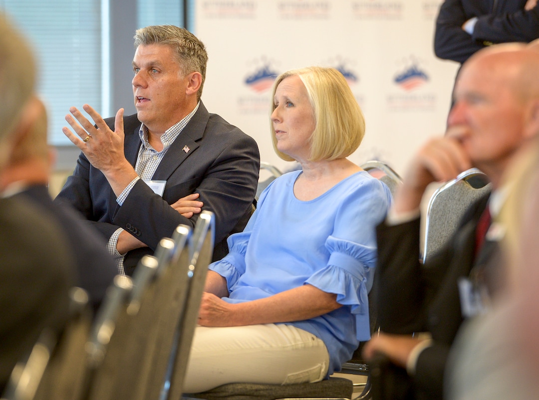 Leah Hogsten  |  The Salt Lake Tribune   San Juan County commissioner Phil Lyman, joined by his wife, Jody, talks with Sen. Mike Lee during a Utah public lands forum hosted by the Sutherland Institute, June 29, 2018.
