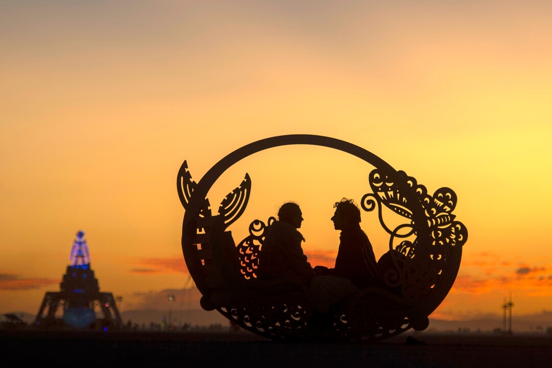 (Rick Egan  |  The Salt Lake Tribune)   Henry Tonoyan, Agnieszka Szefer wait for the sunrise, at Burning Man, in the Black Rock Desert, near Gerlach, Nevada. Saturday, Aug. 31, 2019.