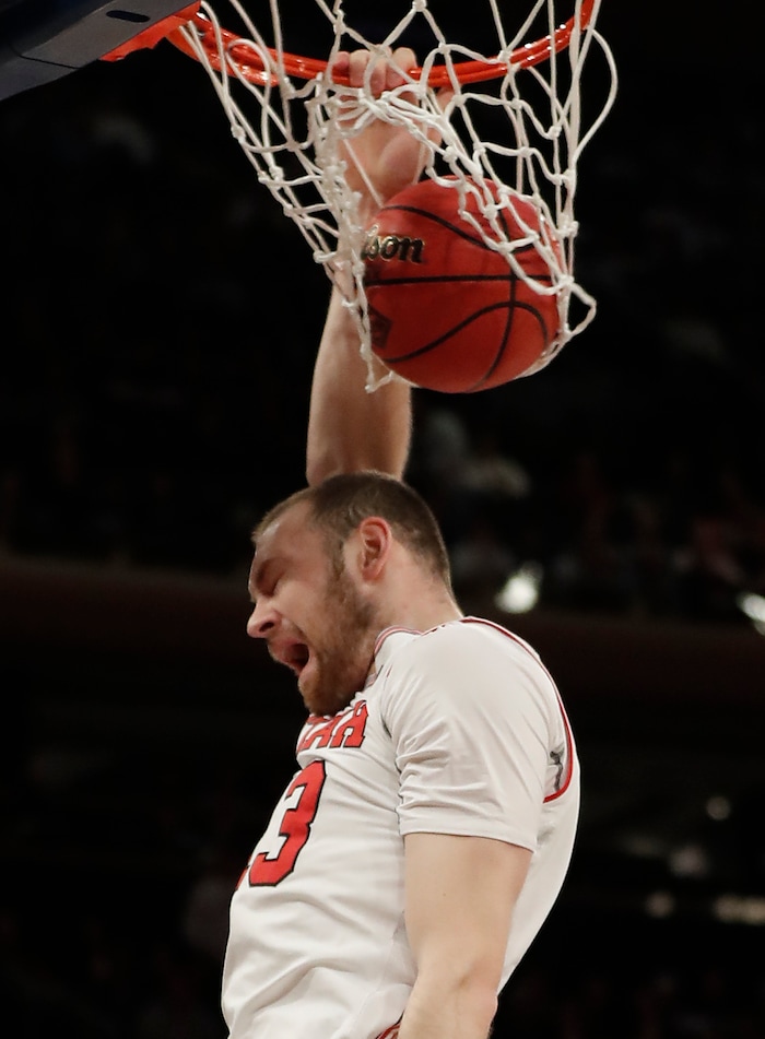 Utah forward David Collette dunks against Penn State in the second quarter of an NCAA college basketball game for the NIT championship Thursday, March 29, 2018, in New York. (AP Photo/Julie Jacobson)