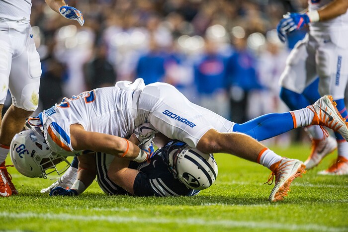 (Chris Detrick  |  The Salt Lake Tribune)  Boise State Broncos linebacker Leighton Vander Esch (38) tackles Brigham Young Cougars wide receiver Talon Shumway (21) during the game LaVell Edwards Stadium Friday, October 6, 2017. 