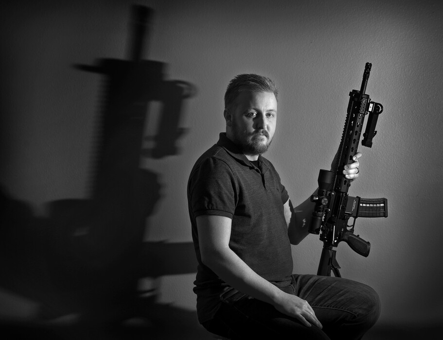 (Leah Hogsten  |  The Salt Lake Tribune)  "I believe the 2nd Amendment was made for civilians to have military style rifles in the home," said  Austin Skousen, 28, an AR-15 owner and collector of firearms, Wednesday, Feb. 21, 2018. 