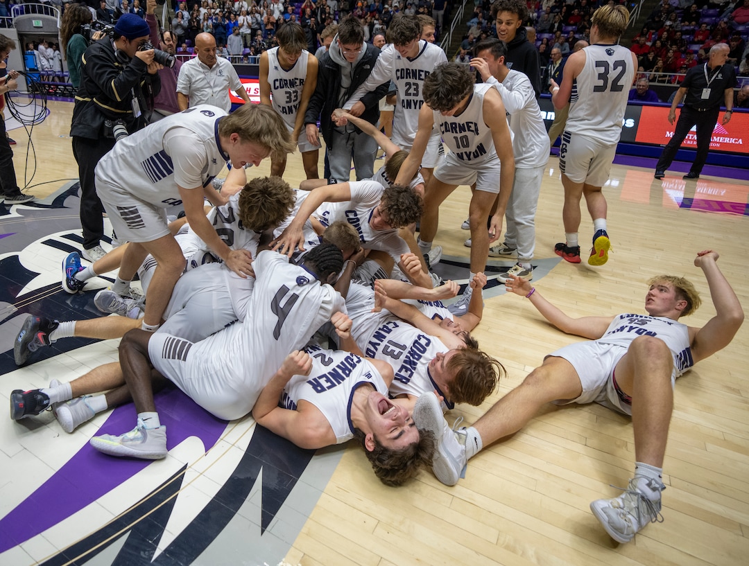 (Rick Egan | The Salt Lake Tribune) The Corner Canyon Chargers celebrates thier win over the American Fork Cavemen, for  the Boys 6A State Championship at Weber State, on Saturday, March 4, 2023.