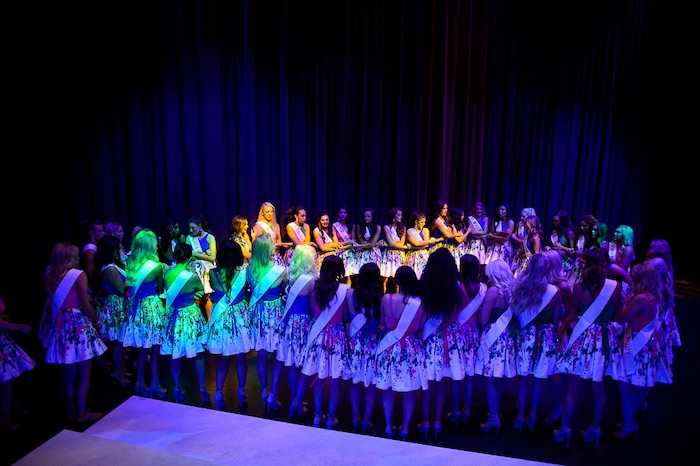 (Trent Nelson | The Salt Lake Tribune)
Contestants gather for a prayer before the curtain goes up at the Miss Utah pageant in Salt Lake City, Wednesday June 13, 2018.