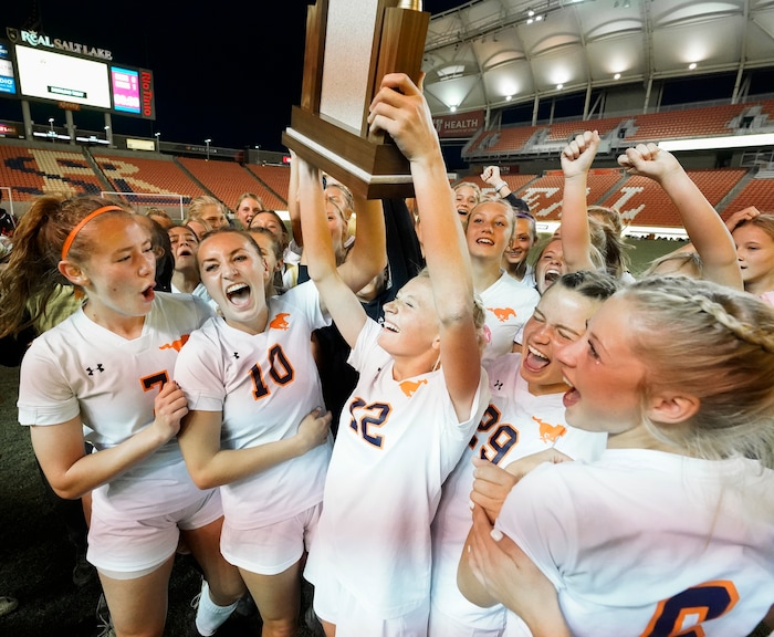 (Leah Hogsten | The Salt Lake Tribune) Mountain Crest celebrates their win at the 4A State Soccer Championship game between Mountain Crest High School and Crimson Cliffs High School, Oct. 22, 2021 at Rio Tinto Stadium. Mountain Crest defeated Crimson Cliffs 1-0 in double overtime.