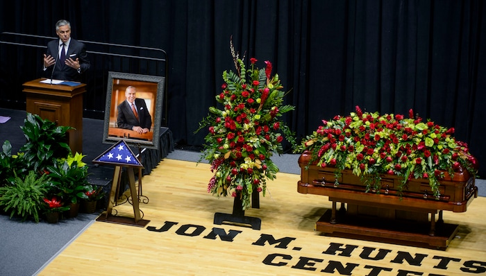 (Steve Griffin  |  The Salt Lake Tribune)  Jon Huntsman Jr. speaks about his father's legacy during funeral services for Jon Huntsman Sr. at the Huntsman Center on the University of Utah campus in Salt Lake City Saturday February 10, 2018.