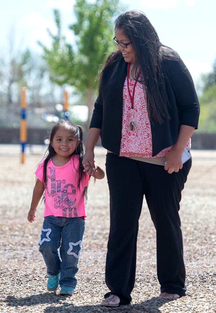 (Rick Egan  |  Tribune File Photo)  Laurel Yellowhorse plays with her 3-year-old daughter RaeLynn, at the playground near the Paiute Tribal office in Cedar City, Wednesday, May 6, 2015.
