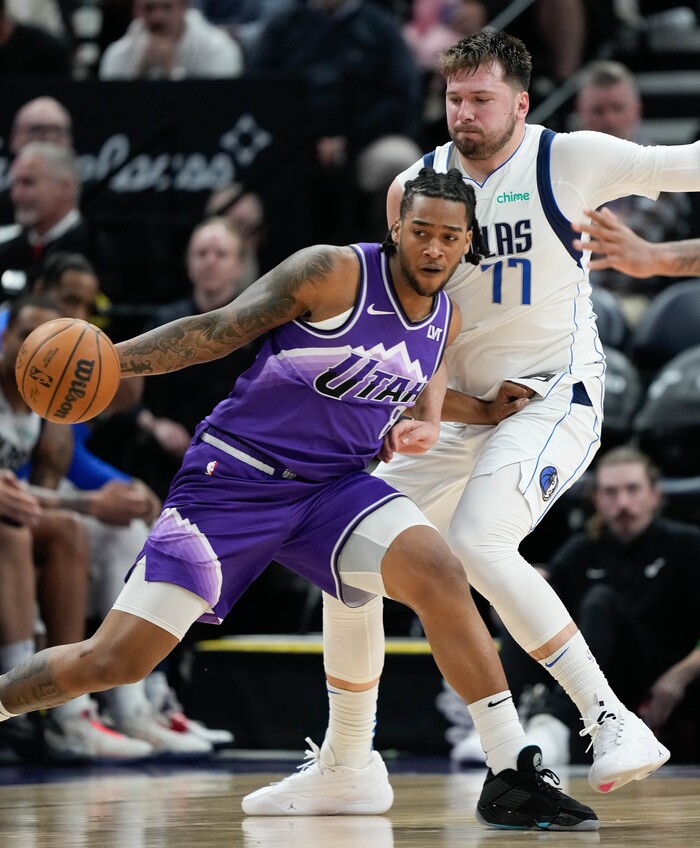 (Francisco Kjolseth  |  The Salt Lake Tribune) Utah Jazz forward Brice Sensabaugh (8) goes up against Dallas Mavericks guard Luka Doncic (77) during an NBA basketball game Monday, March 25, 2024, in Salt Lake City.