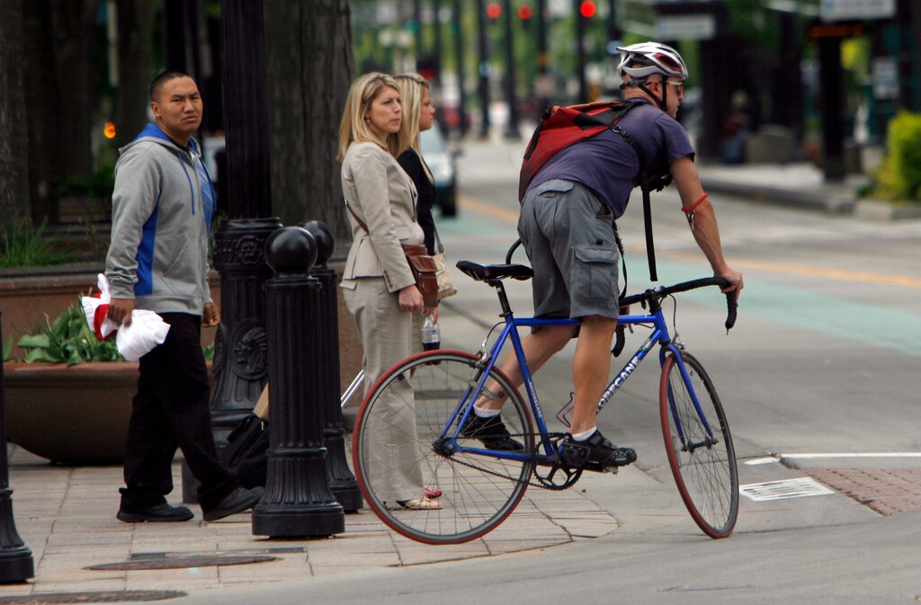(Francisco Kjolseth  |  Tribune file photo)

Bicyclists make their way through downtown Salt Lake CIty traffic. The Utah Department of Transportation is working on a policy that covers bikes and pedestrians.