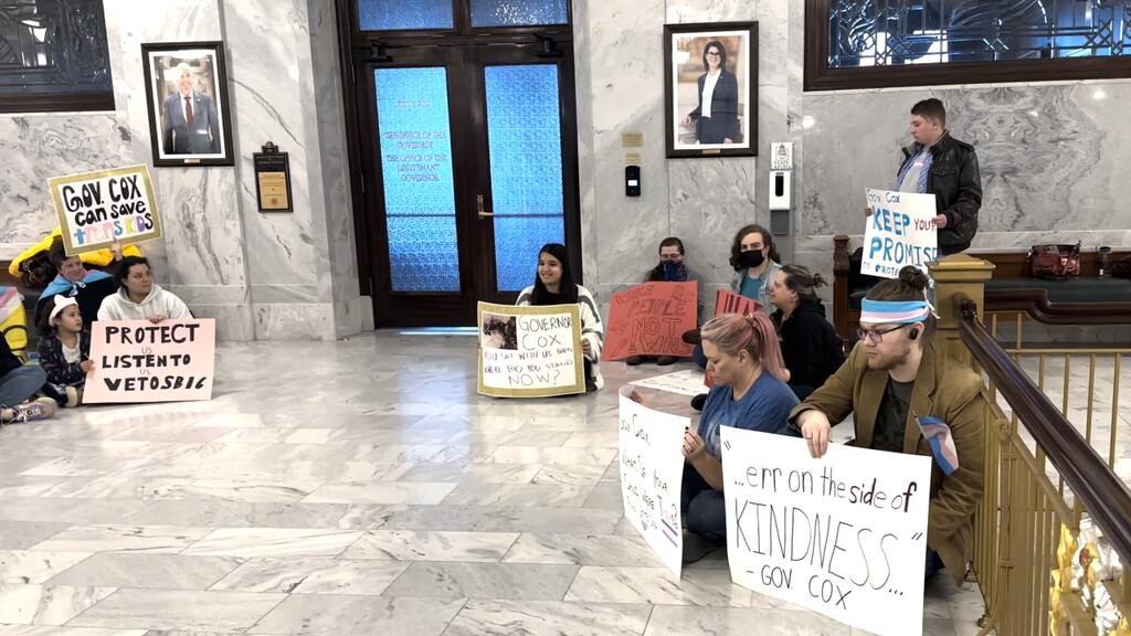 LGBTQ rights activists stage a demonstration outside Utah Gov. Spencer Cox's office. (Ben Winslow|FOX 13 News)