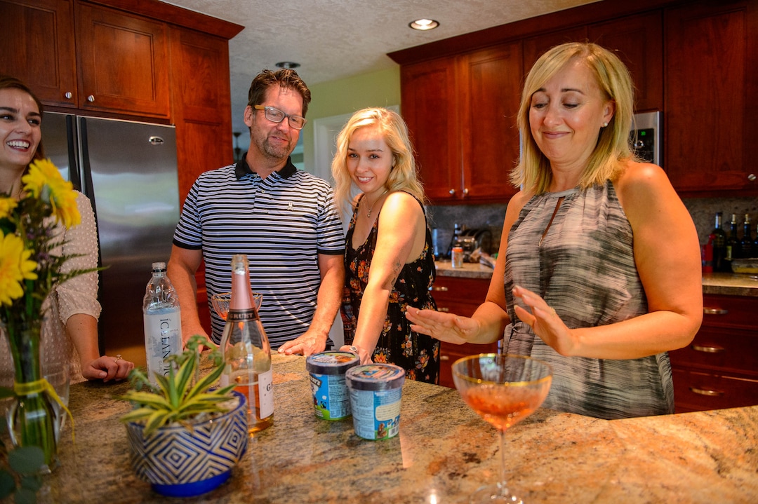 (Trent Nelson  |  The Salt Lake Tribune)  One year after Joslyn Spilsbury was killed outside of a Starbucks in Millcreek, prosecutors still haven't charged the driver with a crime. Her family is trying to deal with the pain on this sad anniversary by remembering her how she'd want to be remembered: with champagne, her favorite foods and family. From left, Elizabeth Cooper, Randall Cooper, Vanessa Cooper, and Erin Cooper in Salt Lake City on Saturday June 8, 2019.
