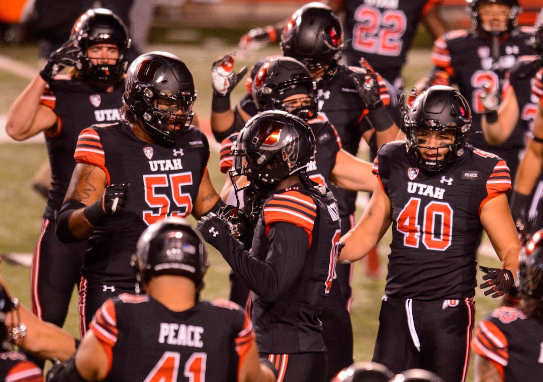 (Trent Nelson  |  The Salt Lake Tribune) The Utah Utes warm up as they prepare to host the USC Trojans, NCAA football at Rice-Eccles Stadium in Salt Lake City on Saturday, Nov. 21, 2020.