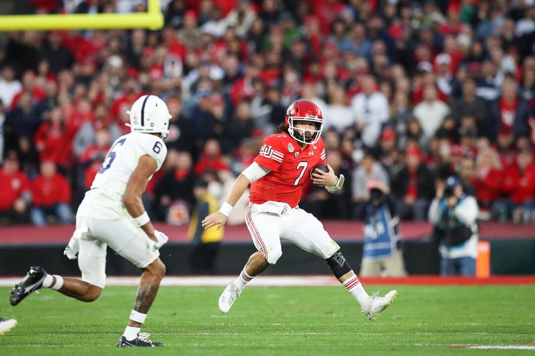 (Meg Oliphant | Special to The Tribune) Utah quarterback Cameron Rising (7) runs with the ball in the third quarter against the Penn State Nittany Lions at Rose Bowl Stadium on Jan. 2, 2023 in Pasadena, Calif.