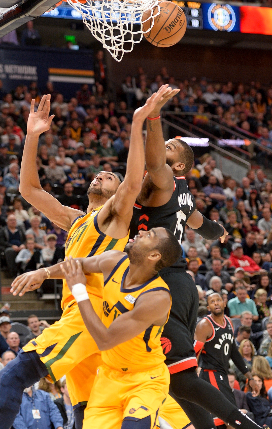 Leah Hogsten  |  The Salt Lake Tribune  Utah Jazz center Rudy Gobert (27) battles Toronto Raptors center Greg Monroe (15) under the net as the Utah Jazz lose to the Toronto Raptors, 111-124, Monday, Nov. 5, 2018 at  Vivint Smart Home Arena.