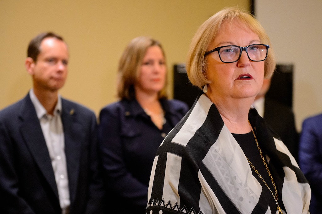 (Trent Nelson  |  The Salt Lake Tribune) Former Utah Supreme Court Chief Justice Christine Durham speaks at a news conference announcing her addition to the legal team representing Matt and Jill McCluskey (at left) in their case against the University of Utah, in Salt Lake City on Monday, Nov. 25, 2019.