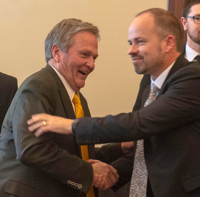 (Rick Egan  |  The Salt Lake Tribune)   Rep. Timothy Hawks sharks hands with Sen. Jerry Stevenson, after meeting togeather about the alcohol bill, Thursday, March 14, 2019. 

