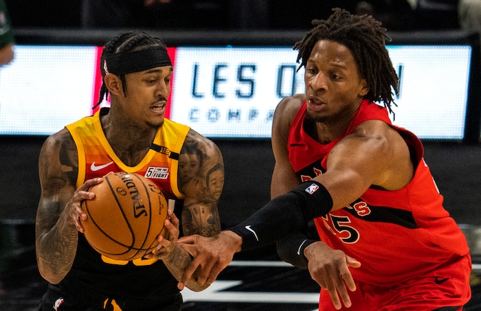 (Rick Egan | The Salt Lake Tribune) Toronto Raptors forward Freddie Gillespie (55) guards Utah Jazz guard Jordan Clarkson (00), in NBA action between the Utah Jazz and the Toronto Raptors at Vivint Arena, on Saturday, May 1, 2021.