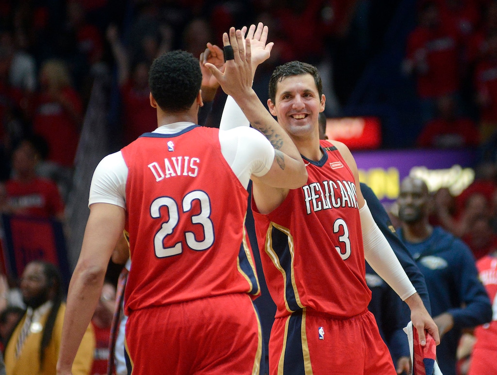 New Orleans Pelicans forward Nikola Mirotic (3) celebrates with forward Anthony Davis (23) during the first half of Game 3 of a first-round NBA basketball playoff series against the Portland Trail Blazers in New Orleans, Thursday, April 19, 2018. (AP Photo/Veronica Dominach)