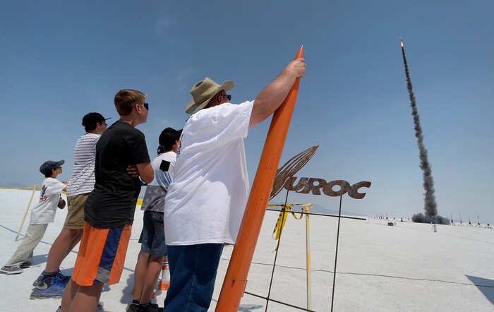 (Scott Sommerdorf   |  The Salt Lake Tribune)   Spectators watch rockets launch on the Bonneville Salt Flats during "HellFire" — the event sponsored by the Utah Rocket Club on Saturday, Aug. 5, 2017.