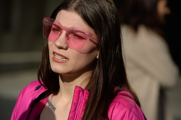 (Francisco Kjolseth | The Salt Lake Tribune) Kyli Rodriguez-Cayro speaks agains the normalization of rape and sexual violence while joining other activists in Utah outside of Salt City Tattoo on Friday, Dec. 22, 2017, to protest following an Instagram post made by the shop's official Instagram account. The post in question was of a gift provided during the shop's white elephant exchange, a gift one of the artists at the parlor called a "rape kit," containing leather gloves, black duct tape, a bottle of lubricant, rope, and a knife.