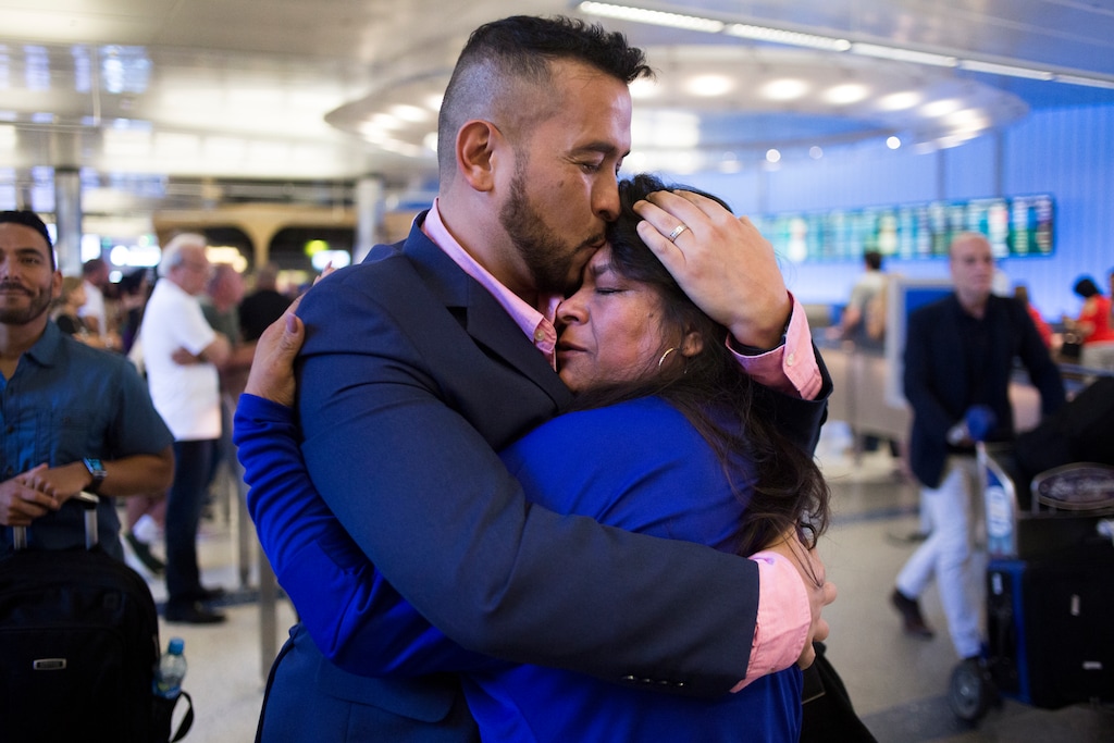 (Jenna Schoenefeld | The Washington Post) Marco Villada with his mother, Hilda Garibay, at LAX.